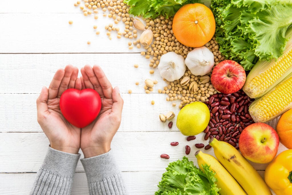 a picture of beans and fruit and other healthy foods